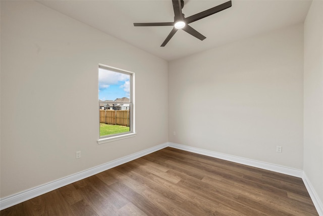10917 Granada Dr, Waco, TX 76708 - spare room with dark wood finished floors, baseboards, and ceiling fan