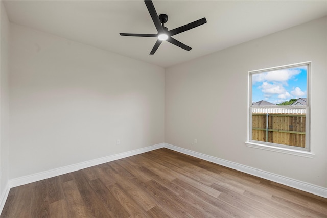 10917 Granada Dr, Waco, TX 76708 - unfurnished room with wood finished floors, baseboards, and a ceiling fan