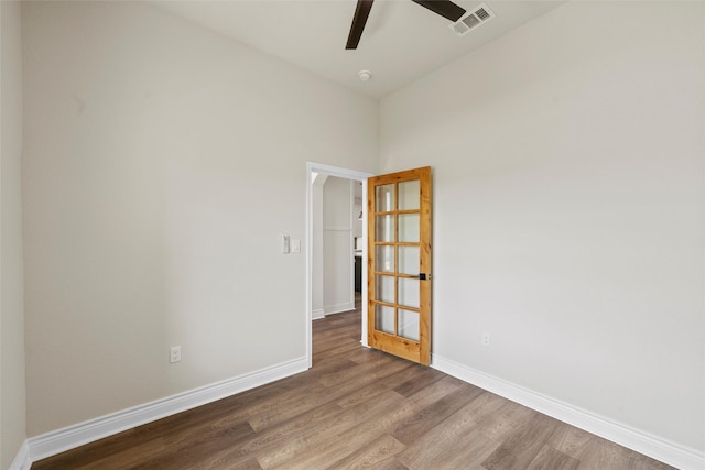 10917 Granada Dr, Waco, TX 76708 - unfurnished room with wood finished floors, baseboards, and a ceiling fan