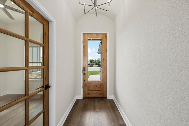 10917 Granada Dr, Waco, TX 76708 - entryway with dark wood finished floors, baseboards, lofted ceiling, and a chandelier