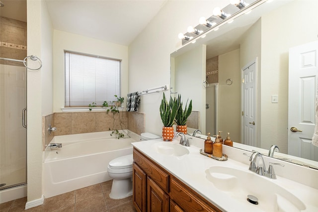 10325 Hogan Dr, Benbrook, TX 76126 - full bathroom with a shower stall, a bath, double vanity, tile patterned flooring, and toilet