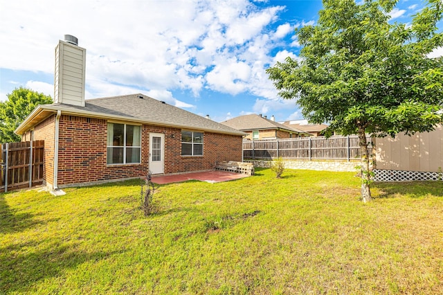 10325 Hogan Dr, Benbrook, TX 76126 - back of property featuring brick siding, a chimney, a patio area, and roof with shingles