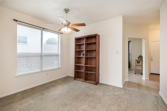 10325 Hogan Dr, Benbrook, TX 76126 - unfurnished room featuring light colored carpet, ceiling fan, and baseboards