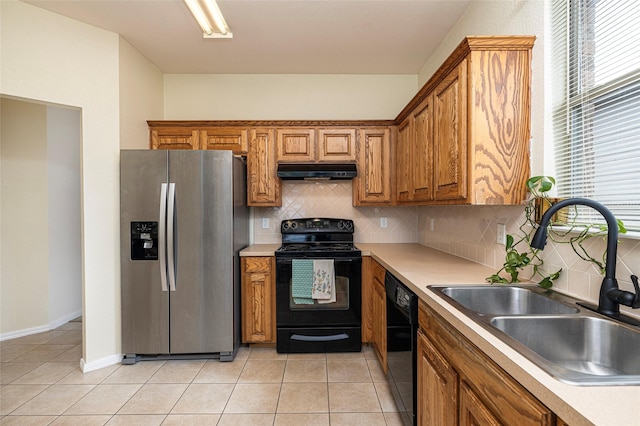 10325 Hogan Dr, Benbrook, TX 76126 - kitchen with black appliances, under cabinet range hood, a sink, and backsplash