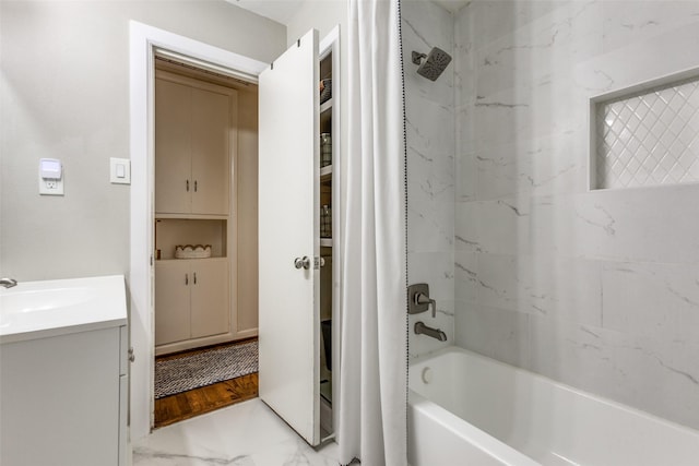 605 Devonshire Dr, Richardson, TX 75080 - bathroom with marble finish floors, vanity, and shower / bath combo