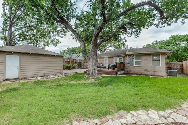 605 Devonshire Dr, Richardson, TX 75080 - view of yard with a wooden deck, an outdoor structure, and central air condition unit