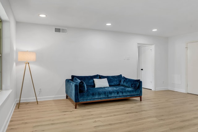 7718 Royal Ln Unit 214, Dallas, TX 75230 - sitting room featuring light wood-style flooring, baseboards, and recessed lighting