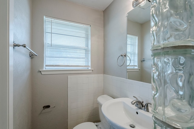 5729 Wales Ave, Fort Worth, TX 76133 - half bath with toilet, a sink, and tile walls