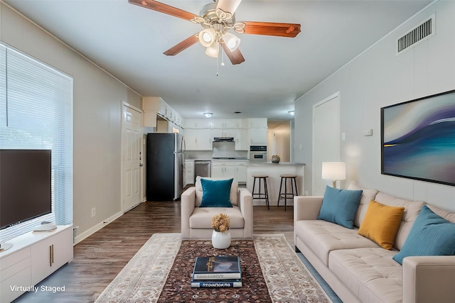 5729 Wales Ave, Fort Worth, TX 76133 - living room featuring wood finished floors, ceiling fan, and baseboards
