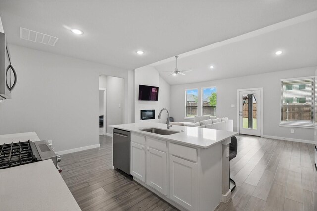 2321 Spring Side Dr, Royse City, TX 75189 - kitchen featuring appliances with stainless steel finishes, a sink, open floor plan, baseboards, and recessed lighting