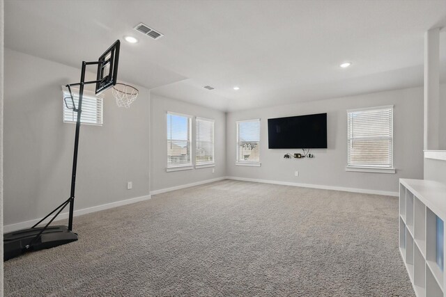 2321 Spring Side Dr, Royse City, TX 75189 - unfurnished living room featuring carpet, baseboards, and recessed lighting
