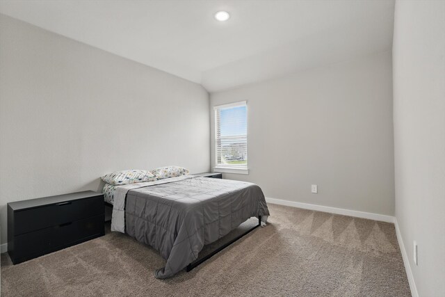 2321 Spring Side Dr, Royse City, TX 75189 - carpeted bedroom with baseboards, recessed lighting, and lofted ceiling