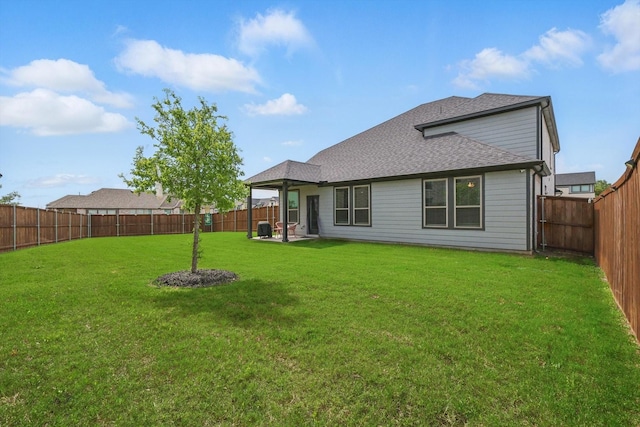 2321 Spring Side Dr, Royse City, TX 75189 - back of house with a patio and a shingled roof