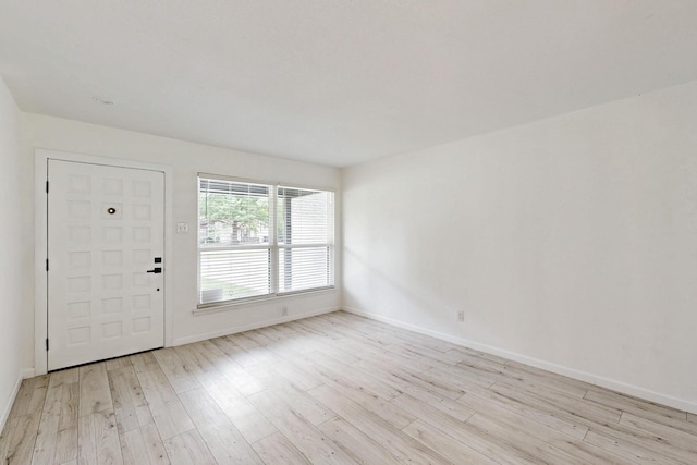 3558 La Prada Dr, Mesquite, TX 75150 - entryway featuring wood finished floors and baseboards