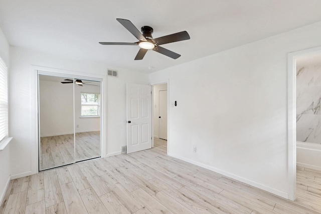 3558 La Prada Dr, Mesquite, TX 75150 - unfurnished bedroom with light wood-type flooring, a closet, baseboards, and a ceiling fan