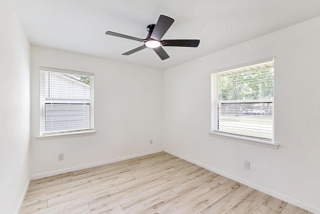 3558 La Prada Dr, Mesquite, TX 75150 - empty room with wood finished floors, baseboards, and a ceiling fan
