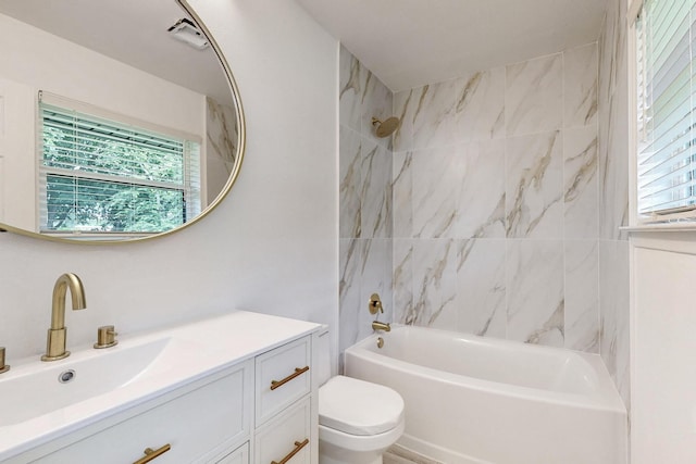 3558 La Prada Dr, Mesquite, TX 75150 - bathroom featuring toilet, vanity, plenty of natural light, and  shower combination