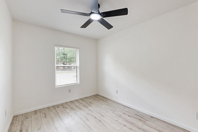 3558 La Prada Dr, Mesquite, TX 75150 - unfurnished room with light wood finished floors, ceiling fan, and baseboards