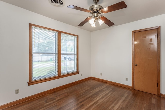 501 Lynch St, Gainesville, TX 76240 - spare room with wood finished floors, baseboards, and ceiling fan