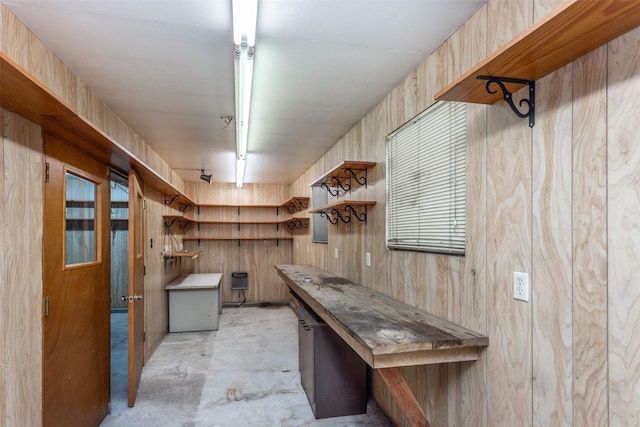 501 Lynch St, Gainesville, TX 76240 - interior space with open shelves, concrete floors, and wooden walls