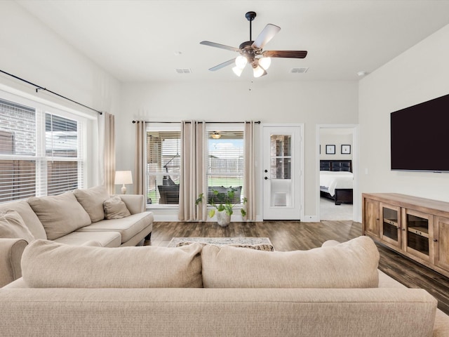 11716 Pistachio Trl, Fort Worth, TX 76108 - living area featuring healthy amount of natural light, a ceiling fan, and wood finished floors