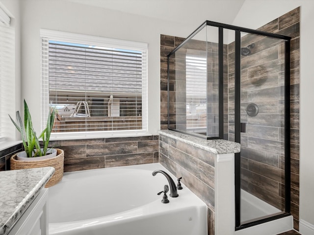 11716 Pistachio Trl, Fort Worth, TX 76108 - bathroom with a bath, a stall shower, and vanity