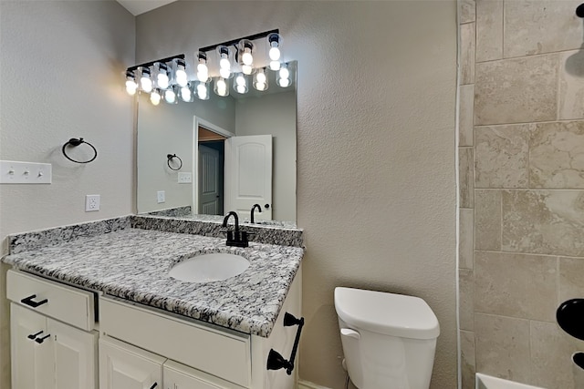 928 Dove Cv, Argyle, TX 76226 - bathroom with toilet, vanity, and bathtub / shower combination