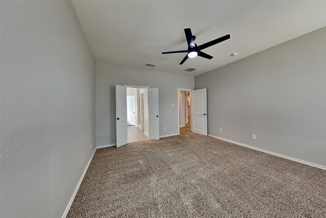 928 Dove Cv, Argyle, TX 76226 - unfurnished bedroom with carpet flooring, baseboards, and a ceiling fan