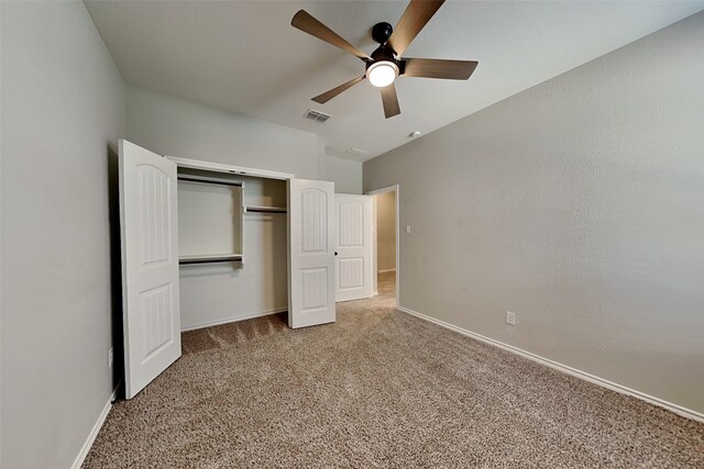 928 Dove Cv, Argyle, TX 76226 - unfurnished bedroom with carpet flooring, a closet, baseboards, and ceiling fan