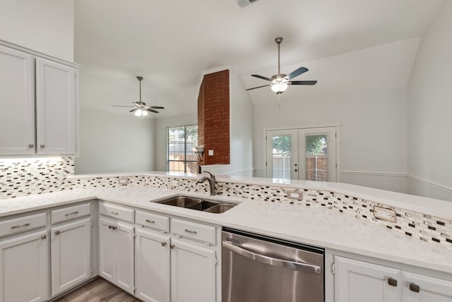 1401 Superior Dr, Flower Mound, TX 75028 - kitchen with dishwasher, a sink, a ceiling fan, decorative backsplash, and vaulted ceiling