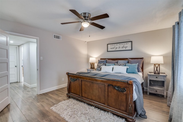 1316 Devonshire Ln, Mesquite, TX 75150 - bedroom featuring light wood finished floors, baseboards, and a ceiling fan