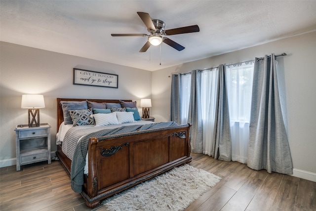 1316 Devonshire Ln, Mesquite, TX 75150 - bedroom featuring wood finished floors, baseboards, and ceiling fan