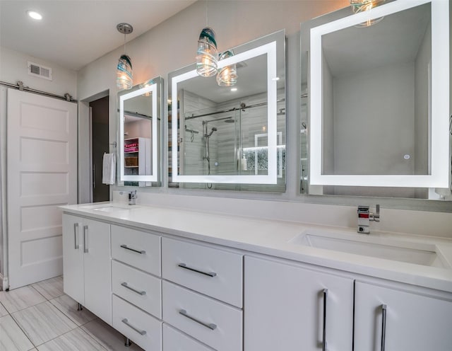 1316 Devonshire Ln, Mesquite, TX 75150 - full bathroom with a shower stall, double vanity, and recessed lighting