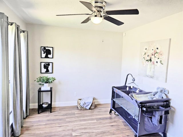 1316 Devonshire Ln, Mesquite, TX 75150 - miscellaneous room with ceiling fan, wood finished floors, and baseboards