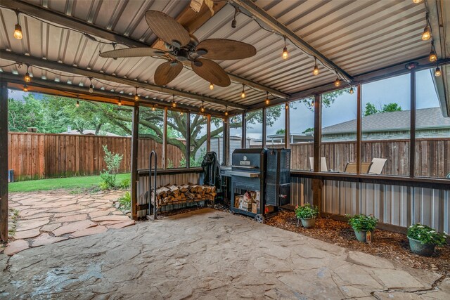 1316 Devonshire Ln, Mesquite, TX 75150 - fenced backyard featuring a patio, a ceiling fan, and area for grilling