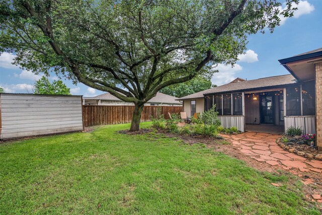 1316 Devonshire Ln, Mesquite, TX 75150 - view of yard featuring a sunroom