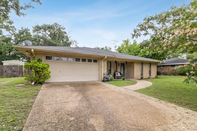 2916 Lafayette St, Corsicana, TX 75110 - ranch-style house featuring driveway, an attached garage, and brick siding