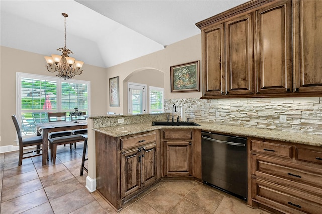 30 Tananger Springs Dr, Denison, TX 75021 - kitchen with dishwashing machine, a sink, tasteful backsplash, arched walkways, and lofted ceiling