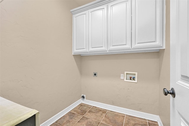 30 Tananger Springs Dr, Denison, TX 75021 - washroom with electric dryer hookup, baseboards, cabinet space, washer hookup, and tile patterned floors