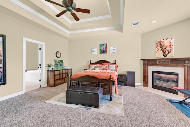 30 Tananger Springs Dr, Denison, TX 75021 - carpeted bedroom with a raised ceiling, ornamental molding, a high end fireplace, recessed lighting, and baseboards