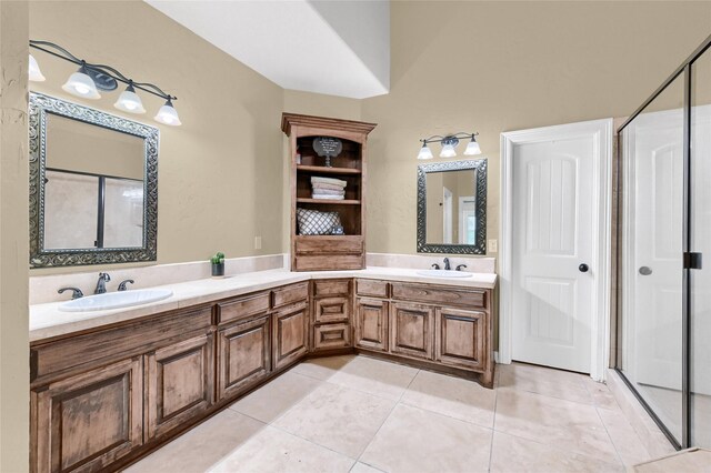 30 Tananger Springs Dr, Denison, TX 75021 - bathroom with double vanity, tile patterned flooring, and a shower stall