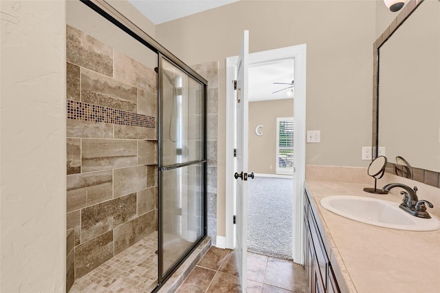 30 Tananger Springs Dr, Denison, TX 75021 - full bath featuring a shower stall, vanity, a ceiling fan, and tile patterned flooring