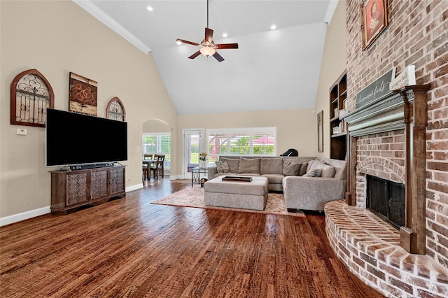 30 Tananger Springs Dr, Denison, TX 75021 - living room with a large fireplace, high vaulted ceiling, ceiling fan, baseboards, and wood finished floors