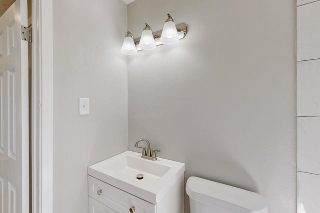 2530 Gerry Way St, Lancaster, TX 75134 - bathroom with toilet and vanity