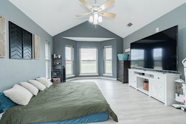 9390 Adams St, Terrell, TX 75160 - bedroom featuring light wood-type flooring, lofted ceiling, and ceiling fan