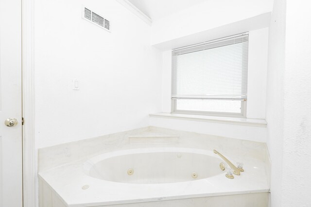 9390 Adams St, Terrell, TX 75160 - bathroom with a tub with jets