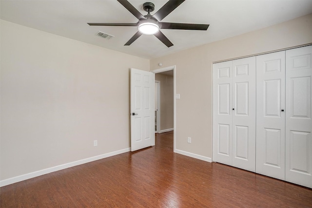 7013 Buttonwood Dr, Fort Worth, TX 76137 - unfurnished bedroom featuring wood finished floors, baseboards, a closet, and ceiling fan