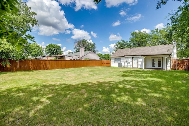 7013 Buttonwood Dr, Fort Worth, TX 76137 - view of yard featuring french doors