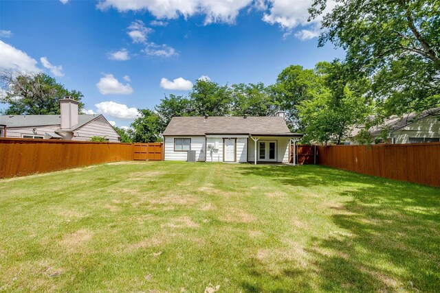 7013 Buttonwood Dr, Fort Worth, TX 76137 - back of property with french doors