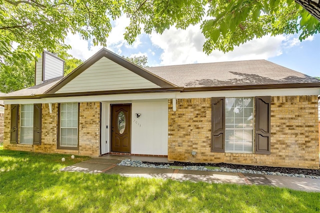 7013 Buttonwood Dr, Fort Worth, TX 76137 - ranch-style home with brick siding, a chimney, roof with shingles, and a front yard